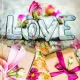 Virágos LOVE feliratos ajándéktasak